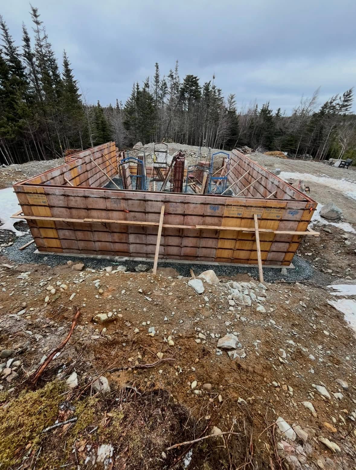 Concrete foundation wall forms prepared for a pour